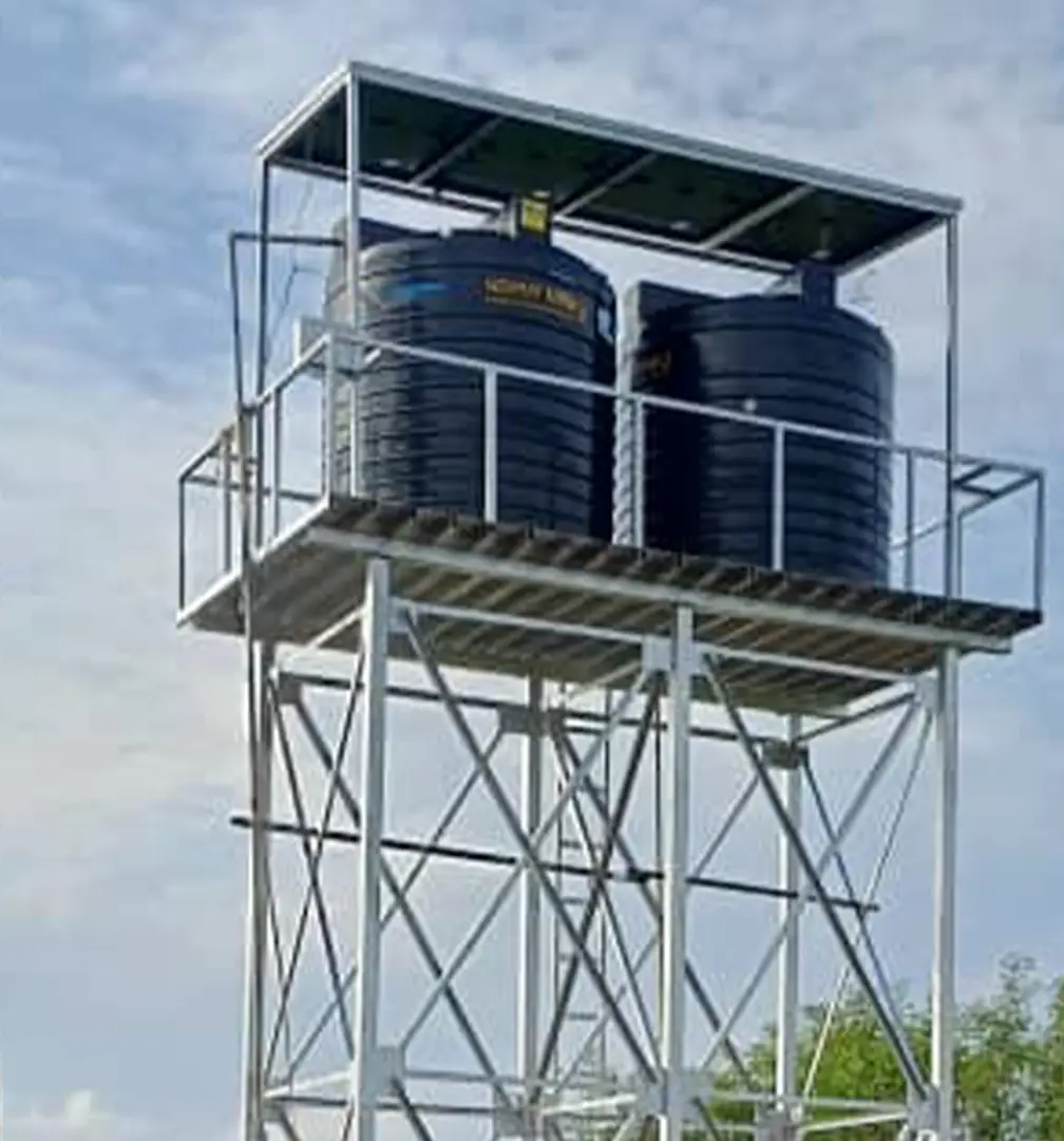 Completed elevated water-storage tower with two tanks at a Lakes State WASH site