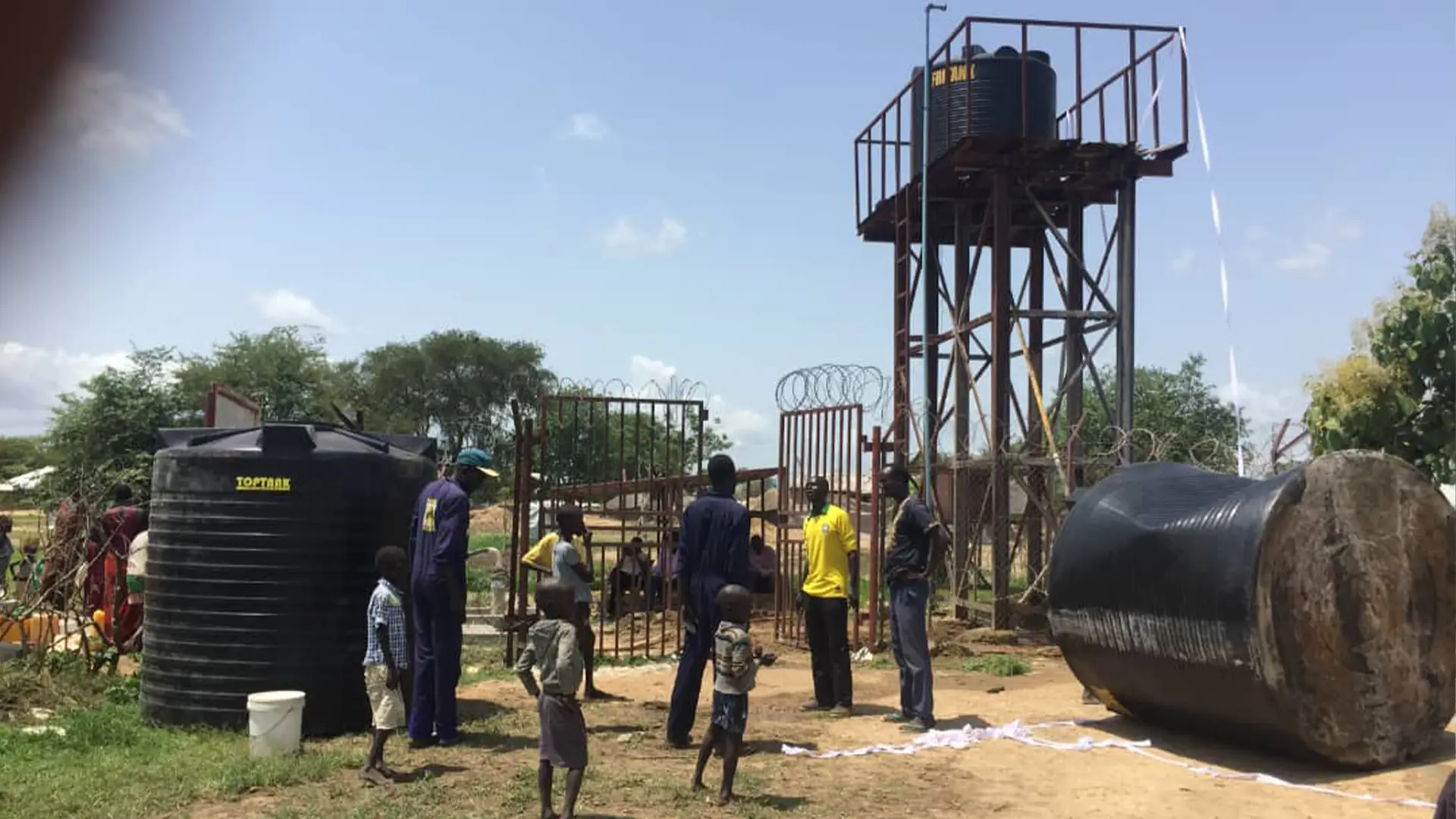 Water tanks and elevated storage structure during system improvement works in Lakes State